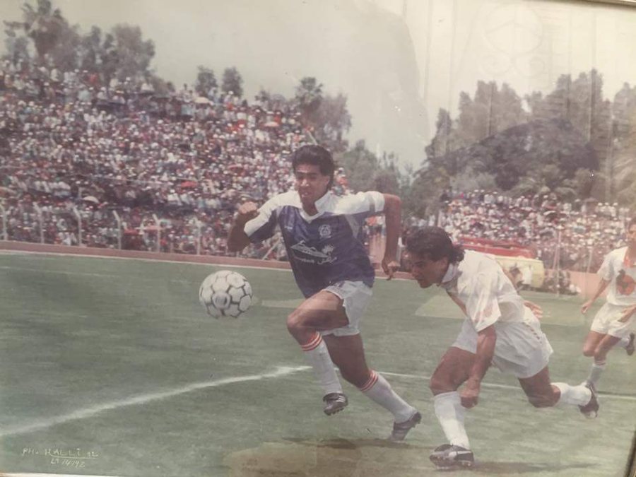 Hicham Dmiai en match, joueur international